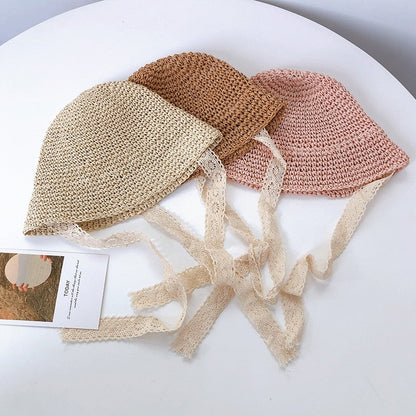Lightweight baby girl's straw hat with pretty lace trim, providing excellent sun protection for toddlers.