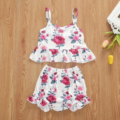 Toddler girl's comfortable floral sling top & shorts set. Perfect holiday or casual warm weather outfit.