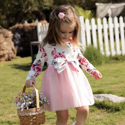 Baby girl's vintage rose print long sleeve dress with bow design at waist for infants.