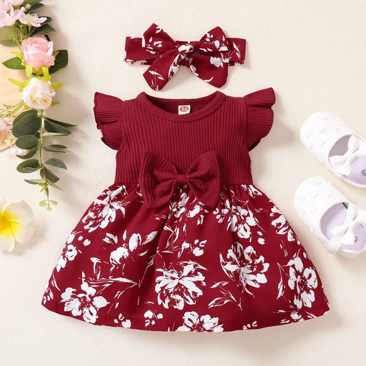 Baby girl's white cotton blend floral princess dress with pink flowers, front view