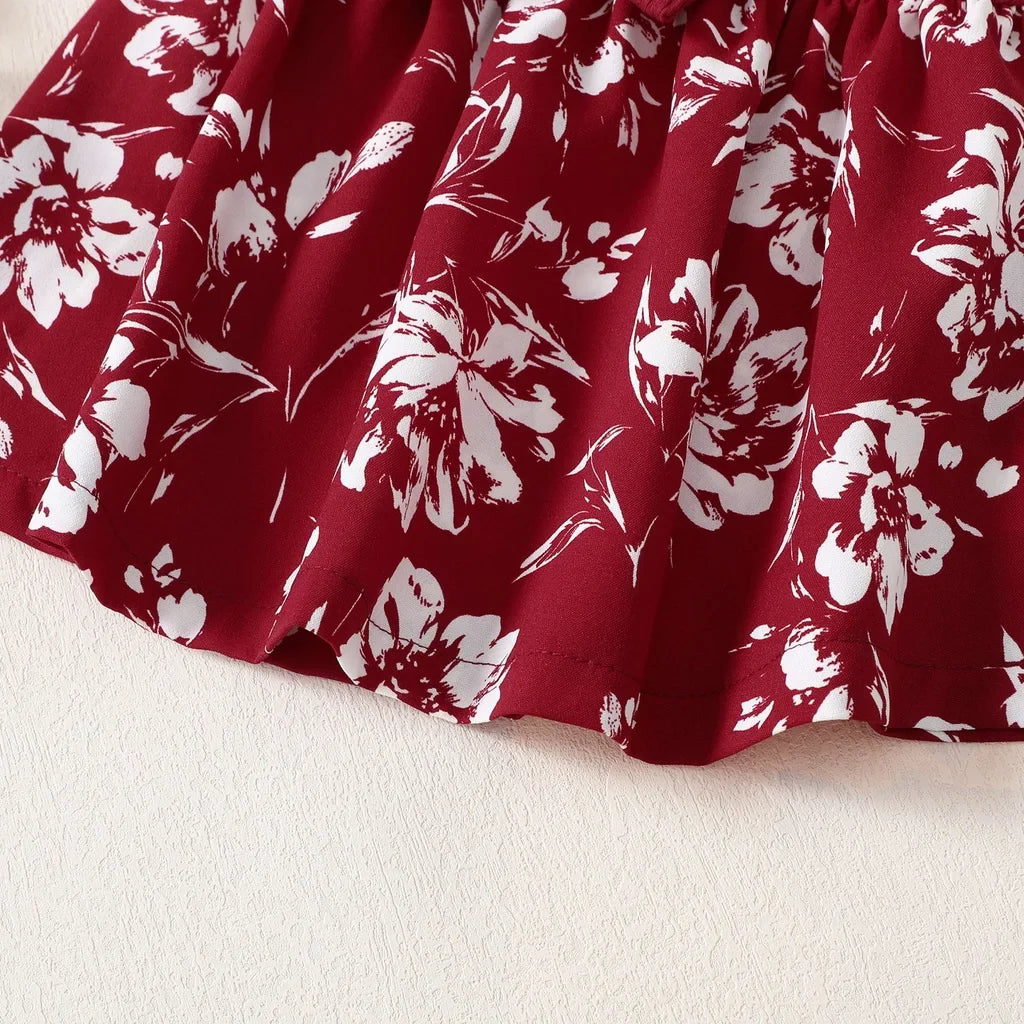 White cotton blend baby girl dress with a charming pink floral pattern, elegant and comfy