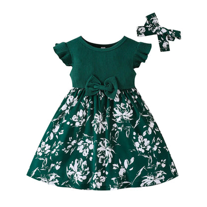 Baby fashion: white cotton blend floral princess dress on a hanger, studio shot
