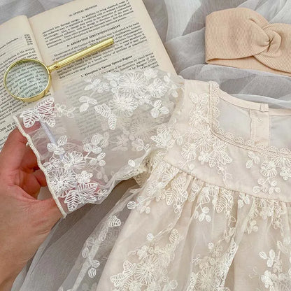 Baby girl's comfortable cotton bodysuit with beautiful lace and embroidered details, summer edition.