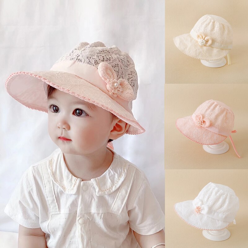 Childrens lace sun hat for girls, offering sun protection with a touch of elegance.