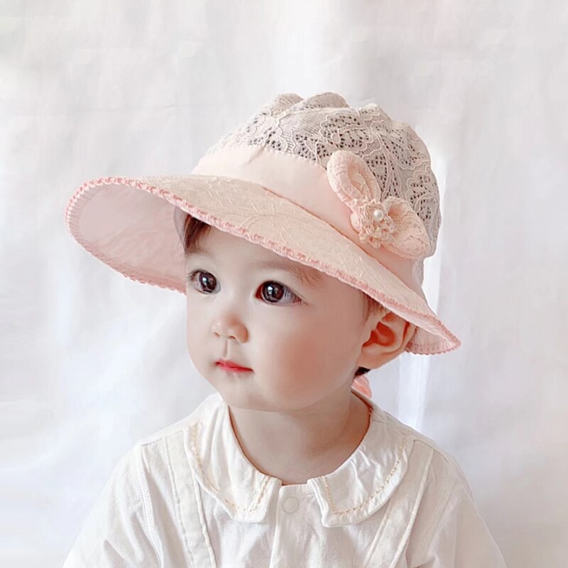 Stylish baby girl's princess hat, featuring beautiful lace and a practical sun brim.