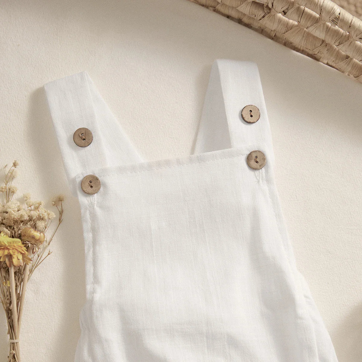 Soft pink sleeveless cotton romper for baby girls, cute and comfy summer playsuit