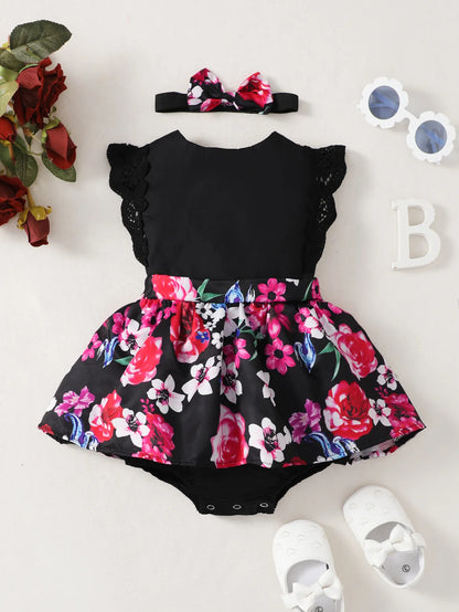 Sleeveless baby girl dress detail: intricate lace and vibrant flower print on polyester material
