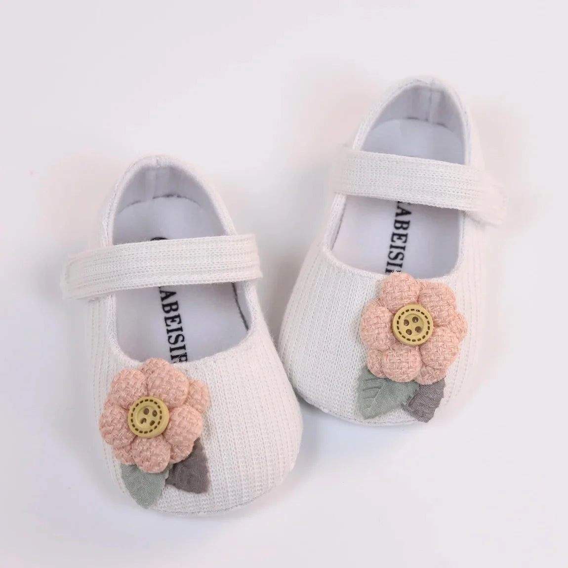 Pink knitted baby girl princess shoes with flower, soft sole for newborns, infant walking footwear