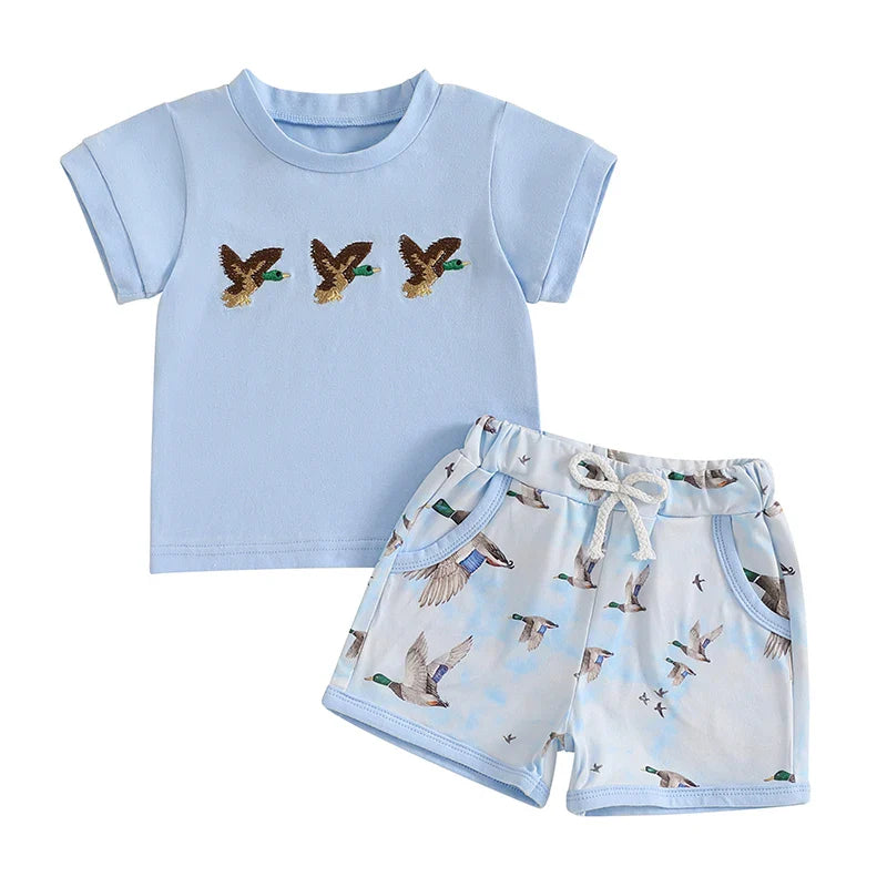 Casual baby girl summer wear: cotton blend floral top, solid shorts, and coordinating head accessory