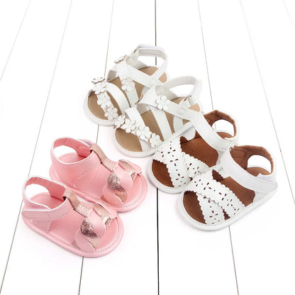 Adorable baby girl summer sandals, pink with hook and loop fasteners and comfortable soft PU sole.
