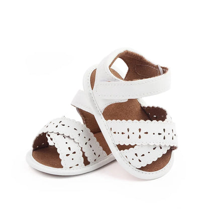 Toddler girl pink summer sandals featuring a soft PU sole and secure hook and loop straps.
