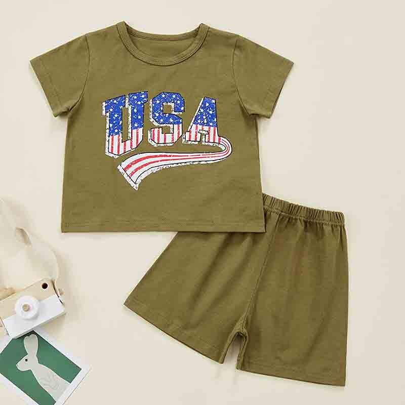 Infant girl and young boy in matching floral print baby clothing, perfect for summer siblings fashion