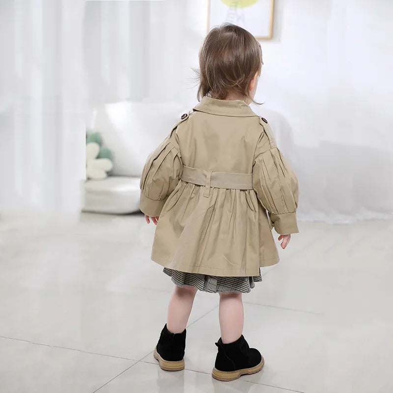 Girls' cotton trench coat in pink, a durable and stylish option for baby fashion.