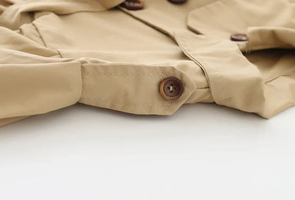 Girls' spring jacket: a charming cotton trench coat with pockets, practical outerwear.