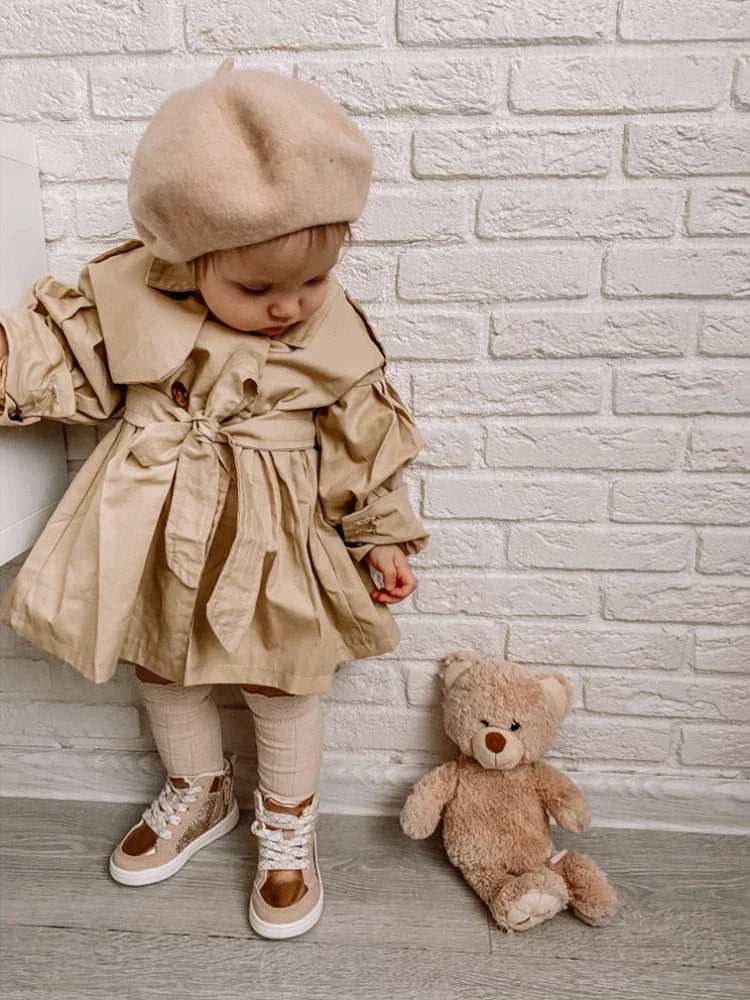 Cute autumn outerwear: baby girl's cotton trench coat with belt detail, comfortable.