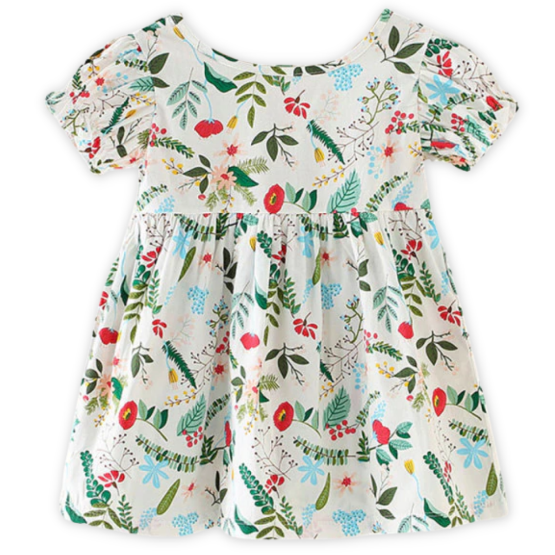 Toddler girl in a floral print puff sleeve dress, ideal casual wear for warm weather.