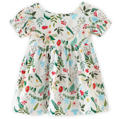 Toddler girl in a floral print puff sleeve dress, ideal casual wear for warm weather.