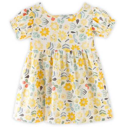 Girls sundress featuring a vibrant nature pattern and stylish puff sleeves, side view.