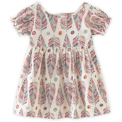 Kids fashion: close-up of the soft cotton fabric and nature pattern on a summer dress.