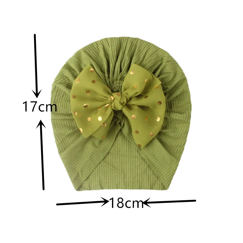 Baby girl fashion: a soft, shiny red bowknot turban hat for infants.