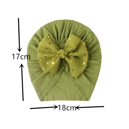 Baby girl fashion: a soft, shiny red bowknot turban hat for infants.
