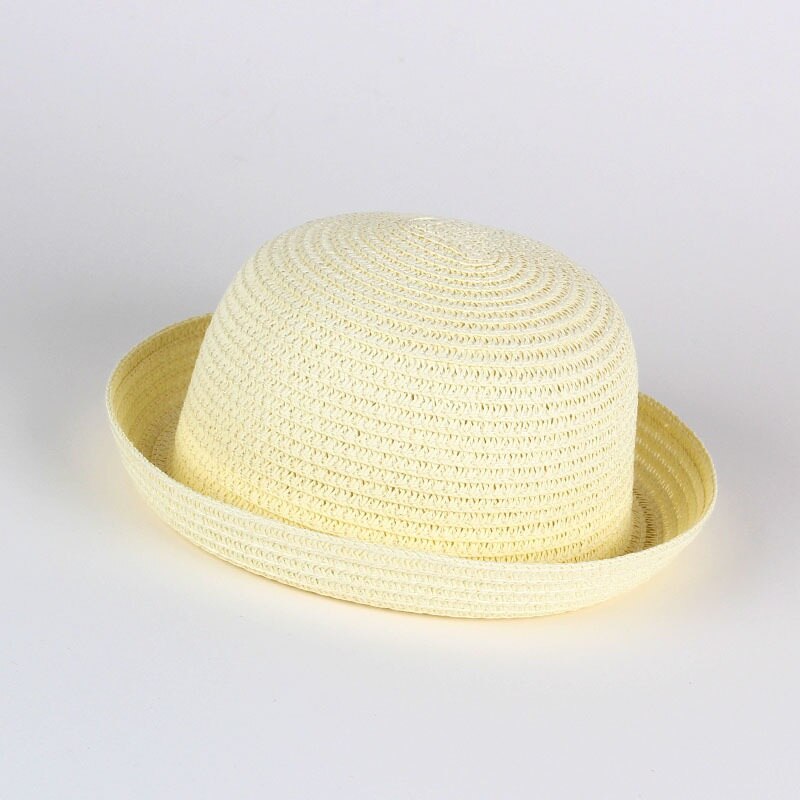Baby girl wearing a wide brim straw sun hat with flower accent, perfect for summer UV protection.