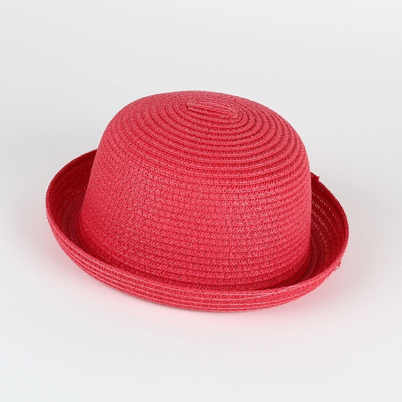 Stylish baby girls straw sun hat, wide brim design ensures maximum sun safety and comfort.