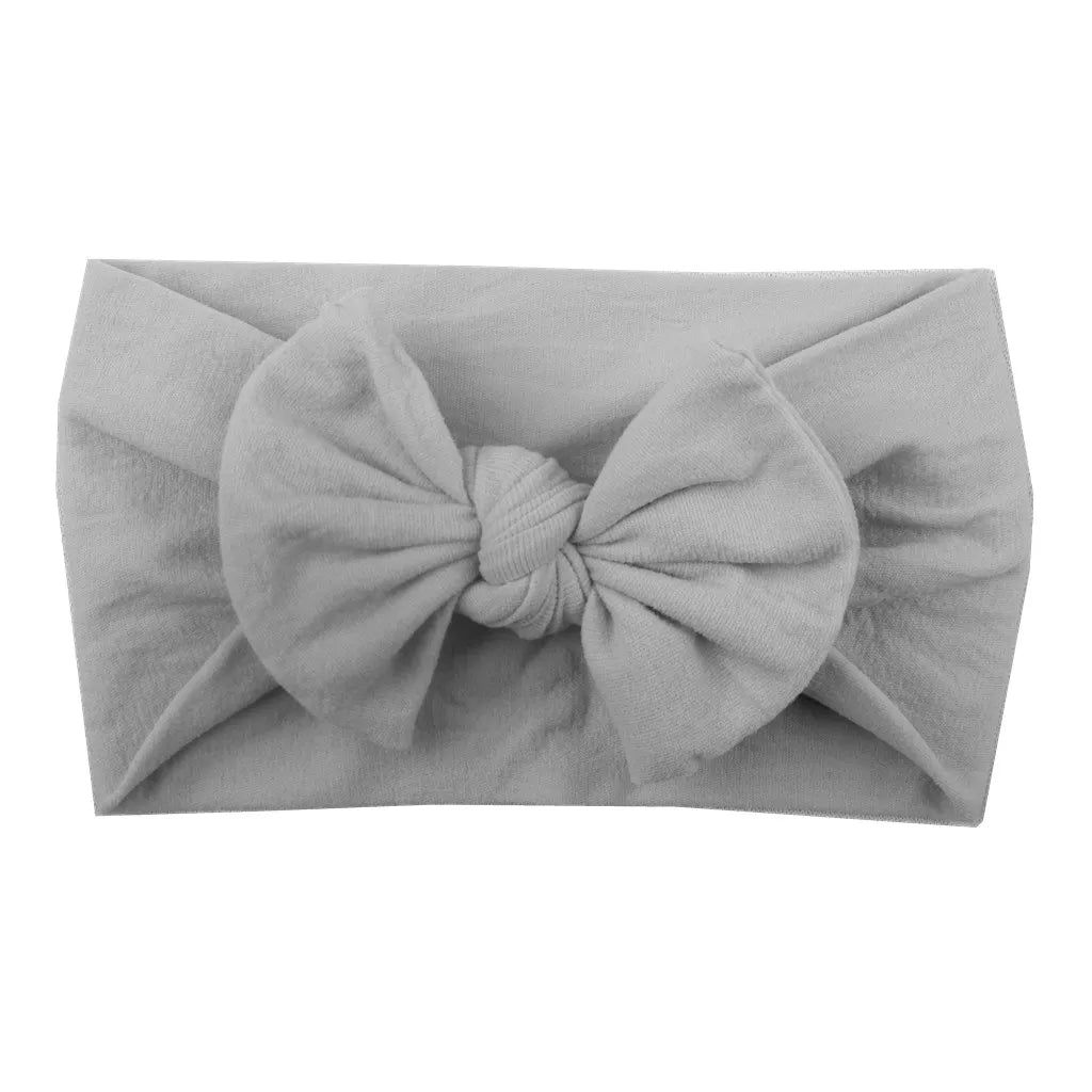 Set of three baby girl elastic headbands with bowknots, perfect baby shower gift.