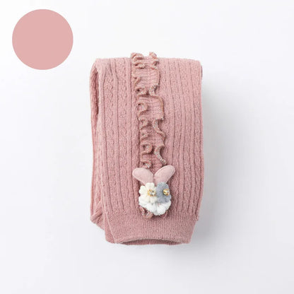 Girls' cozy cotton ribbed tights in shades of pink and purple, perfect for infant comfort.