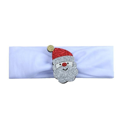 Festive hairband for baby girls, featuring a cute Santa Claus figure on a red headband