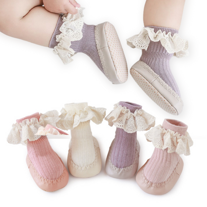 Pack of assorted color baby girl lace cotton anti-slip socks for growing infants.