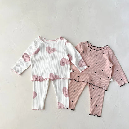 Two-piece baby girl outfit: long-sleeve top and pants with dot print, soft cotton sleeper