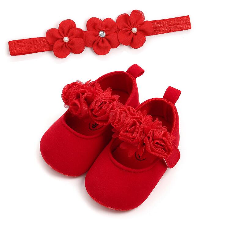 Adorable baby girl's slip-on cotton shoes with pink floral pattern and coordinated headband gift set