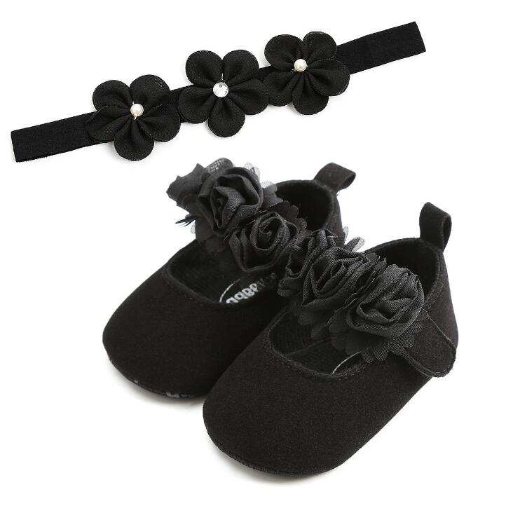 Two floral cotton pre-walker shoes for baby girls, featuring a vibrant floral print and soft construction