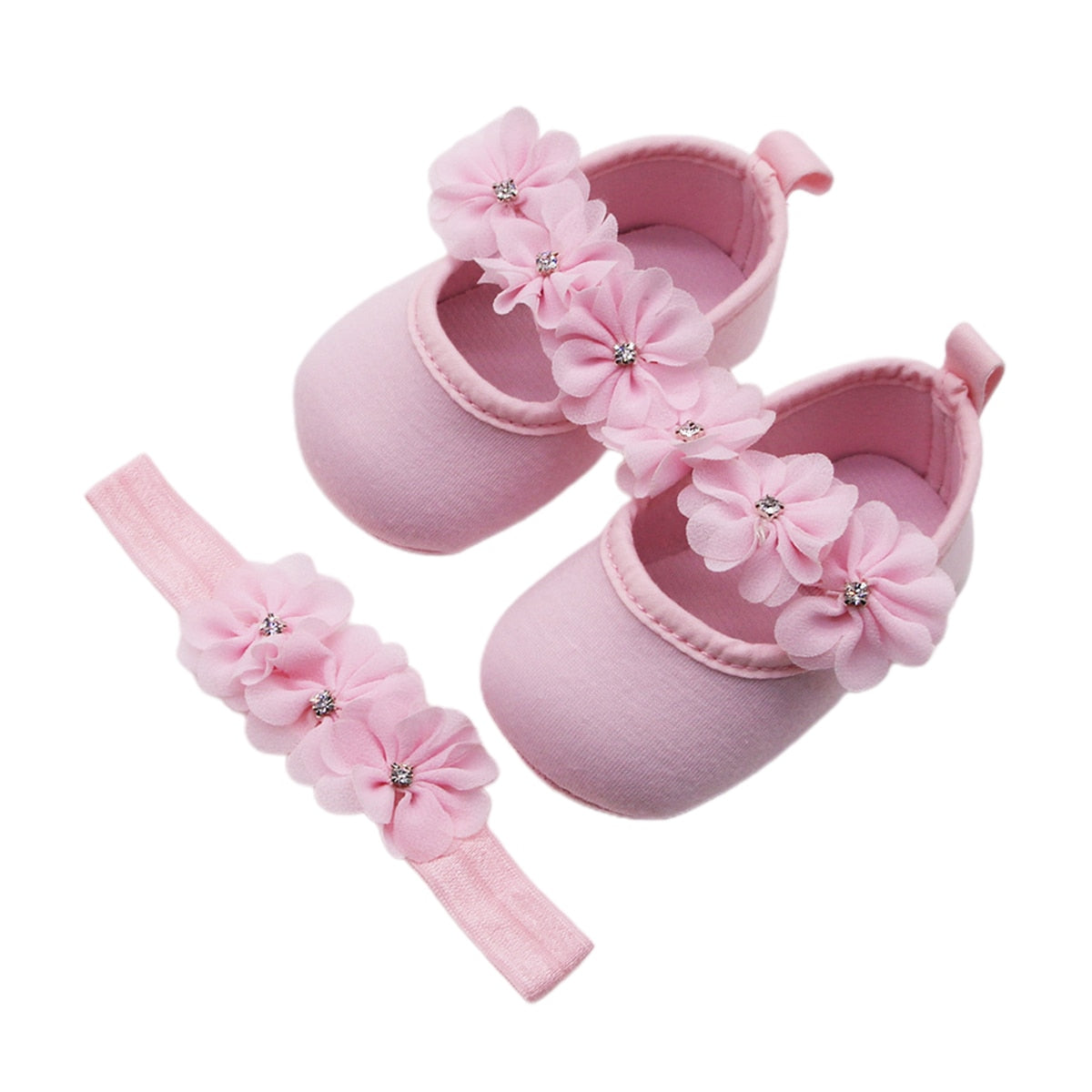 Baby accessories: Floral print cotton pre-walker shoes paired with a cute, matching floral headband