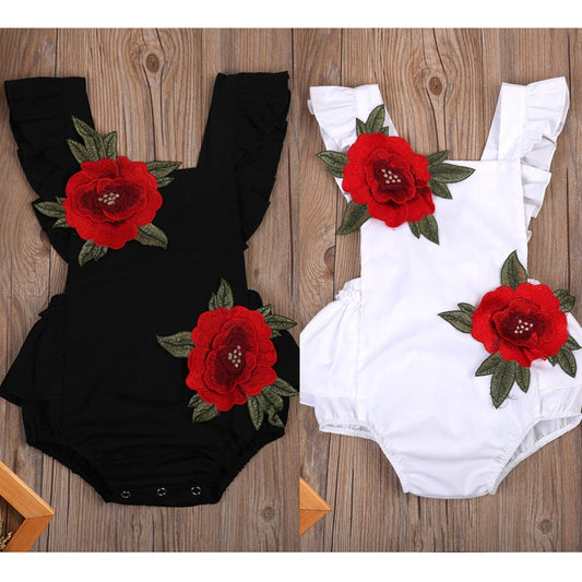 Baby girls' floral cotton romper bodysuit in pink, perfect for summer.