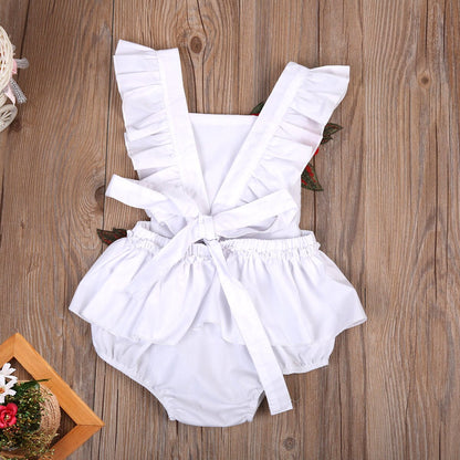 Adorable baby girl's floral print cotton romper, great for a summer outfit.