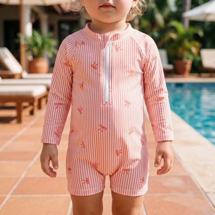 Baby girls' long sleeve rash guard set with sun hat for UPF 50+ sun protection at beach or pool.
