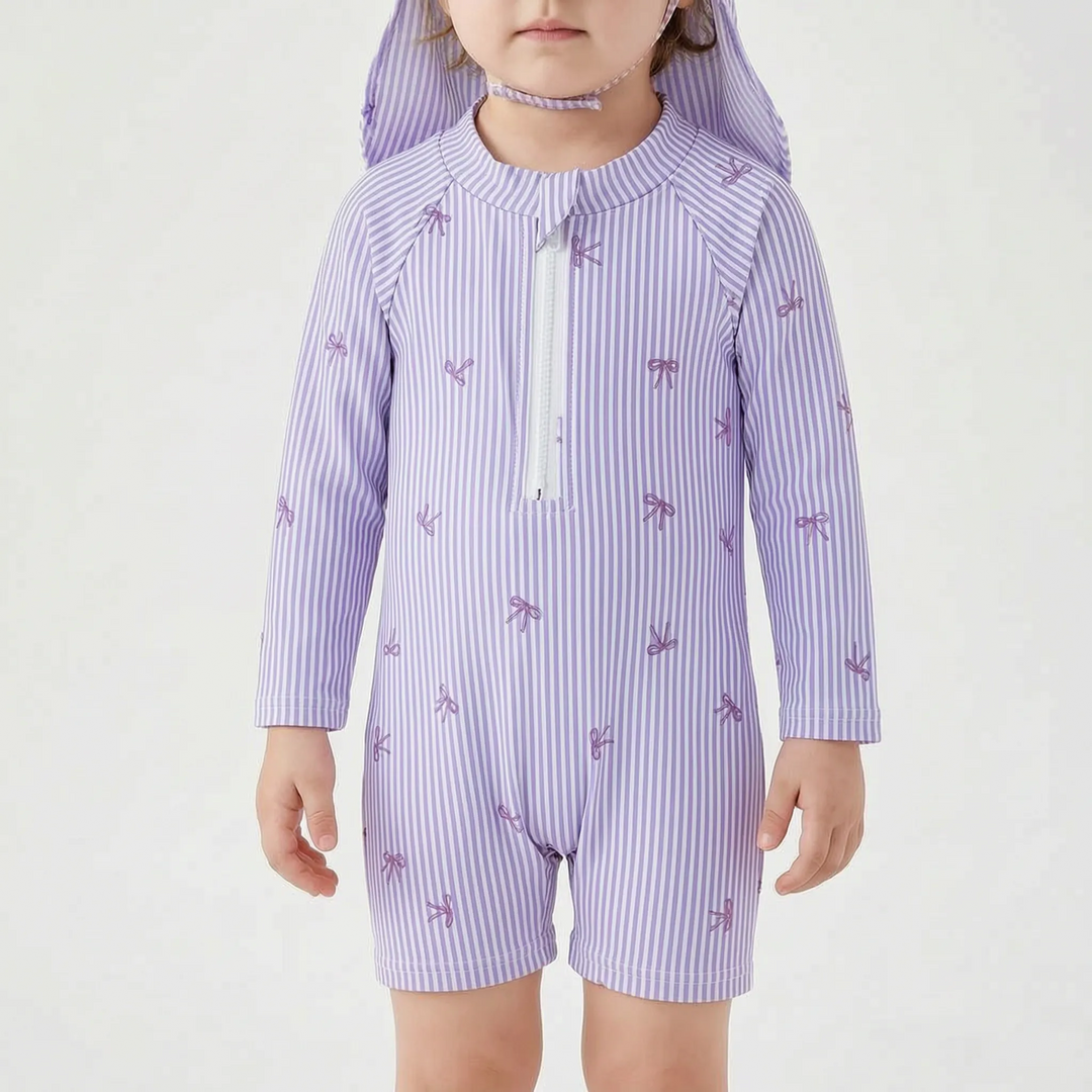 Adorable baby girl's long sleeve rash guard swim set with sun hat, featuring stripes & bows for summer fun.