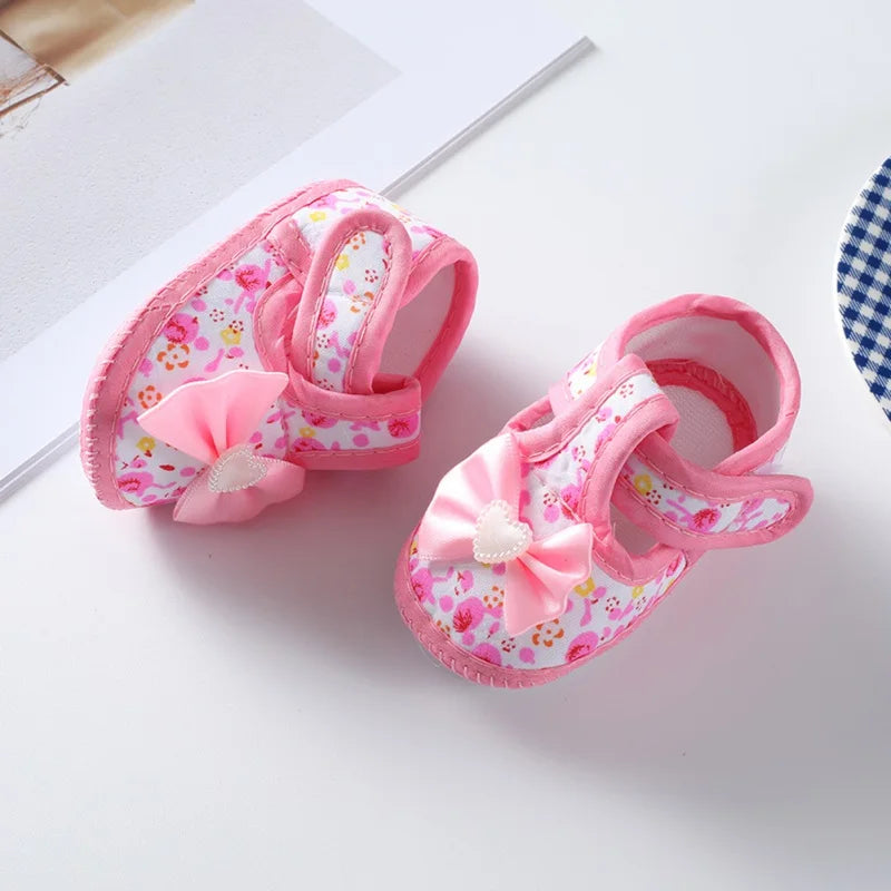 Pink princess first walker shoes for baby girls, non-slip, with easy hook and loop and a charming bow