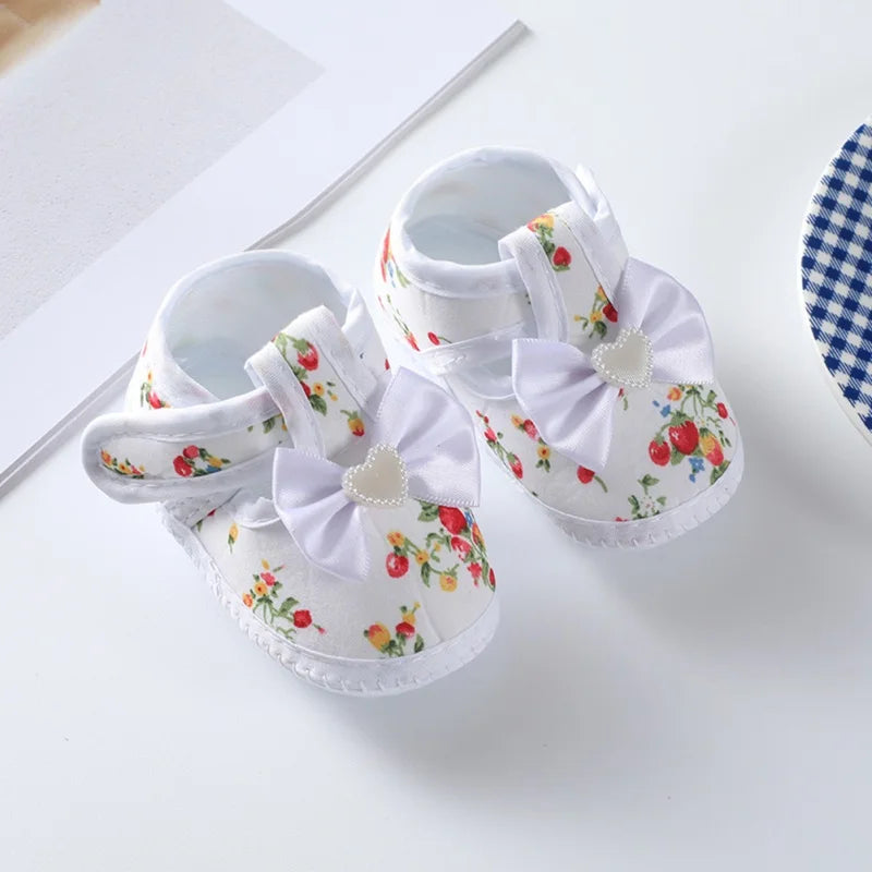 Toddler girl non-slip first walker shoes, pink, with a soft sole for beginning steps and pretty bow