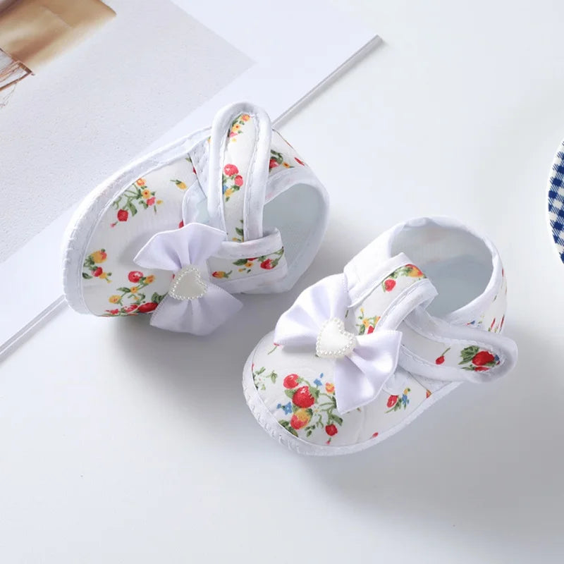 Infant girl princess shoes, non-slip, first walker, pink with a charming bow tie and soft flexible sole