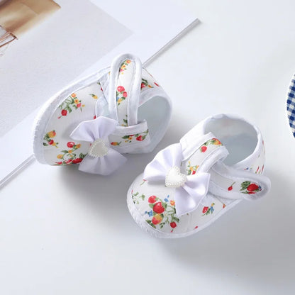 Infant girl princess shoes, non-slip, first walker, pink with a charming bow tie and soft flexible sole