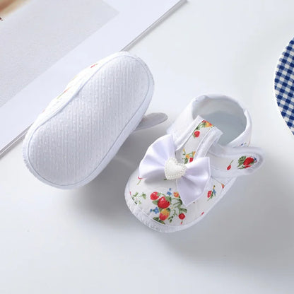 Baby girl first walker shoes, non-slip, stylish pink, with soft sole and an adorable bow tie accessory