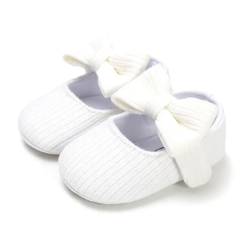 Green baby girl anti-slip sneakers with a cute matching bow, flexible soft sole.