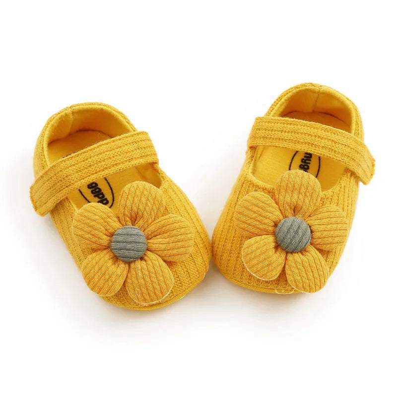 Baby fashion: Girls' peach anti-slip sneakers, soft sole with an elegant bow accent.