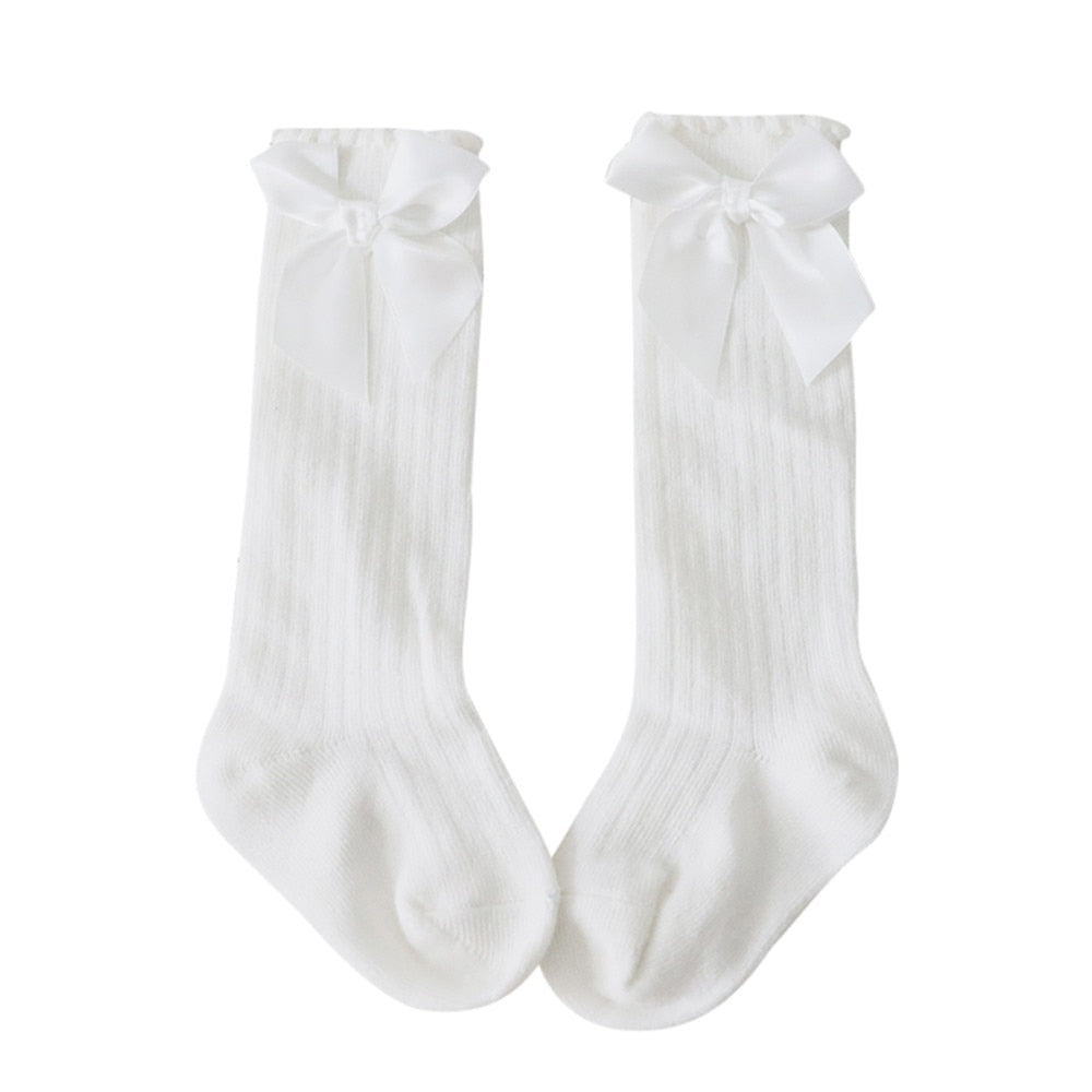 Baby girls' fashion knee-high socks, quality cotton with a cute bow accent