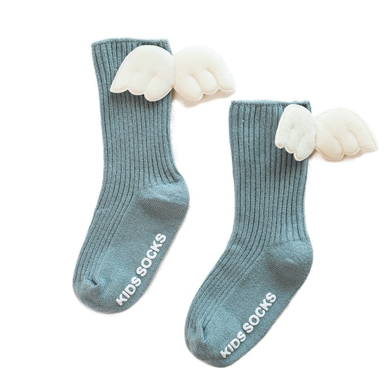 Accessory for baby girls: elegant knee-high cotton socks with a bow