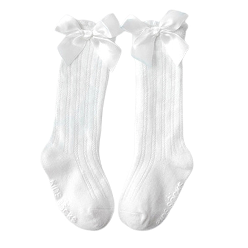 Cute baby girls' white cotton knee-high socks with delicate bowknot detail