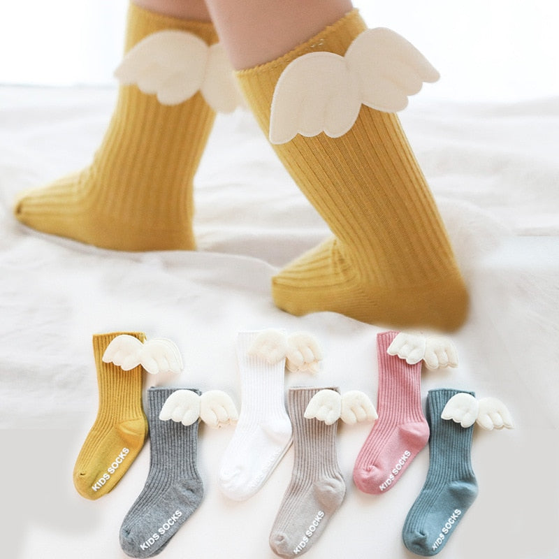 Baby girls' long socks, soft pink cotton with an adorable bowknot